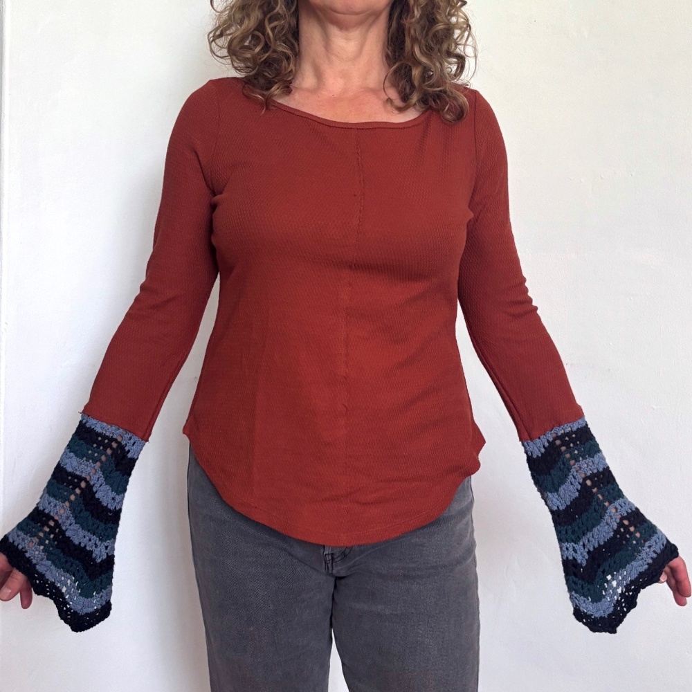 Rust tee with crocheted cuff Anthropologie